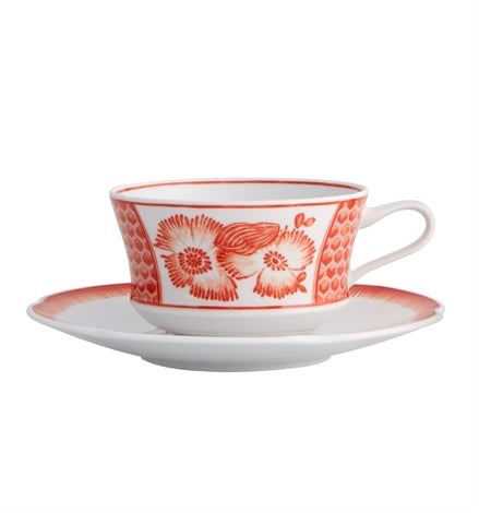 Vista Alegre | Coralina Tea Cup and Saucer featuring a white porcelain design with red floral and geometric patterns, inspired by Oscar de la Renta's haute couture.