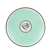 Vista Alegre | Lacroix - Herbariae Set 4 Dessert Plates: Round mint-green ceramic plate with a black rim, featuring a central artichoke engraving.