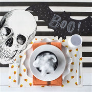 Hester & Cook | Die Cut Bat Placemat featuring a skull and smoke motif, perfect for adding a spooky touch to your table setting.