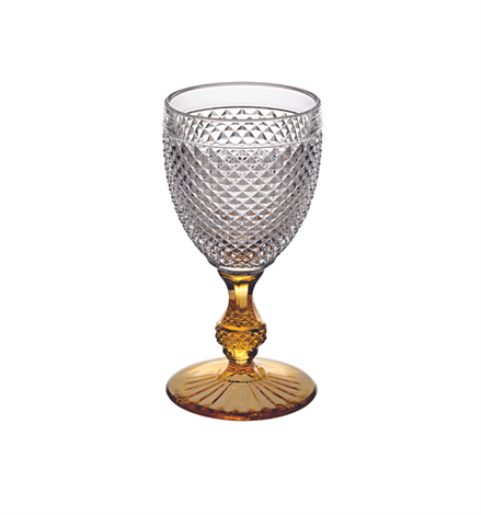 Vista Alegre | Bicos Bicolor Goblet with Amber Stem, featuring a diamond-cut bowl and ornate textured stem. Perfect for enhancing a light, fresh summer table setting.