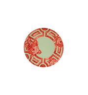 Vista Alegre | The Meaning Dessert Plate featuring a sage-green center, surrounded by a decorative reddish-orange border with peony-like blossoms and geometric motifs.