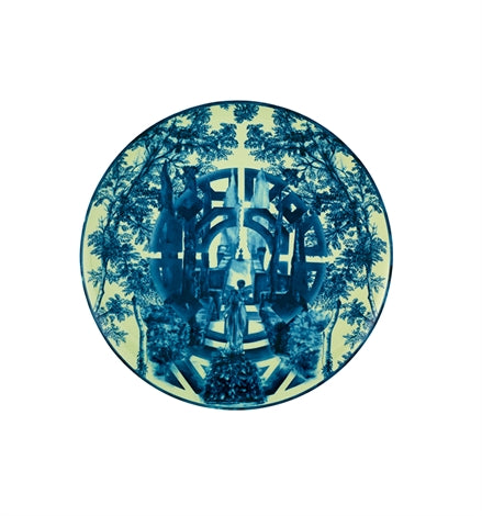 Vista Alegre | The Meaning Charger Plate features a symmetrical, mandala-like design blending natural tree motifs with geometric forms, ideal for a curated dining experience.