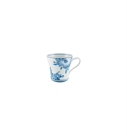 Vista Alegre | Coralina Blue Mug: White ceramic mug with cobalt-blue floral pattern around base and rim, featuring a curved handle and tapered design.
