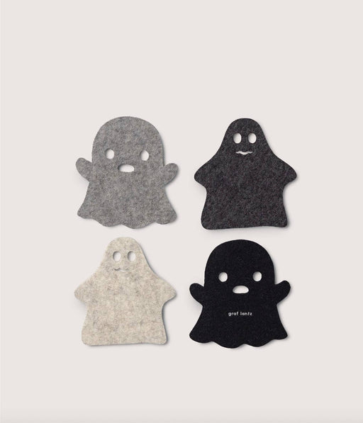 Graf Lantz - Merino Wool Spooky Coaster Multi 4 Pack: Four ghost-shaped felt coasters in shades of gray, showcasing craftsmanship and sustainable design, ideal for enhancing kitchen decor.