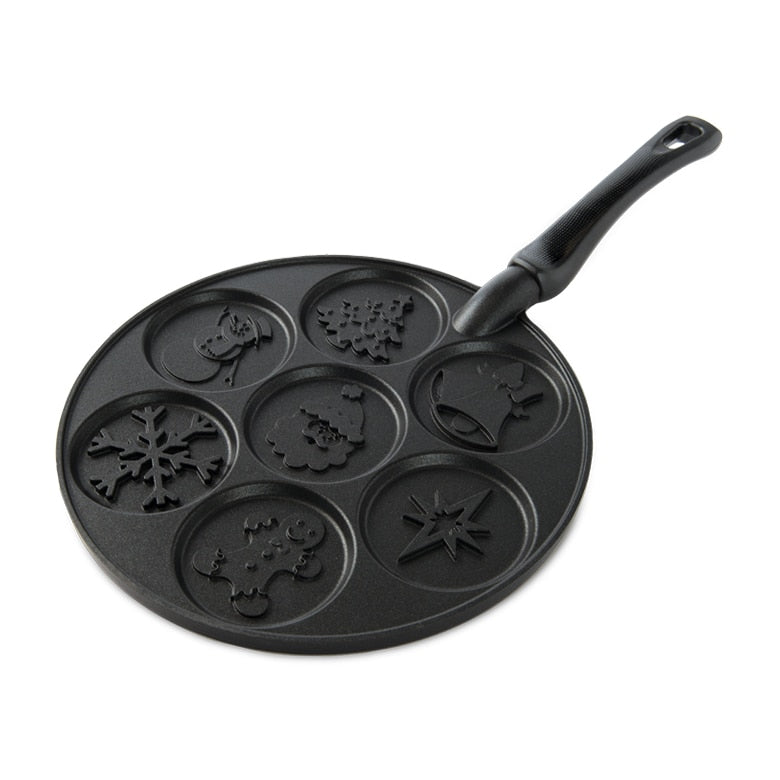 Nordic Ware | Holiday Pancake Pan features festive designs, making seven 3-inch pancakes at once, ideal for joyful breakfasts.