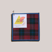 Atelier Saucier | Jubilee Plaid Cocktail Napkins, Set of 4: Red/green/blue tartan napkins, bright blue edge, perfect for holiday gatherings, reclaimed in Los Angeles.