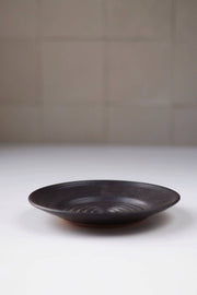 Gravesco Pottery - Garlic Grater Plate in Black, a handcrafted ceramic plate with a textured surface for effortless garlic preparation, ideal for oils and dips.