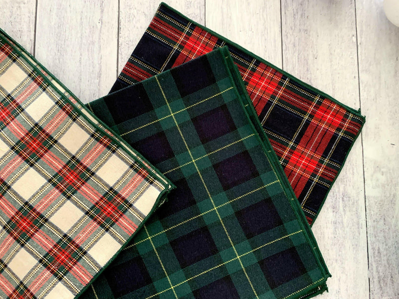 Dot and Army Tartan Cloth Napkins, Set of Four, displayed on wood, showcasing traditional tartan pattern, perfect for elegant dining settings.
