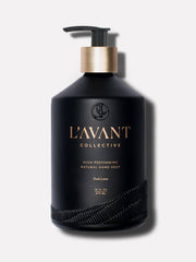 L'AVANT Collective - Fresh Linen Hand Soap in a matte black glass bottle with gold text, offering an eco-luxe handwashing experience with plant-based ingredients.