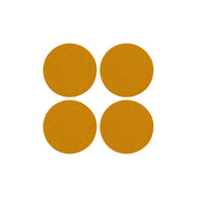 Graf Lantz - Bierfilzl Merino Wool Felt Round Coaster Solid 4 Pack: Turmeric, featuring four round, thick wool felt coasters ideal for protecting surfaces.