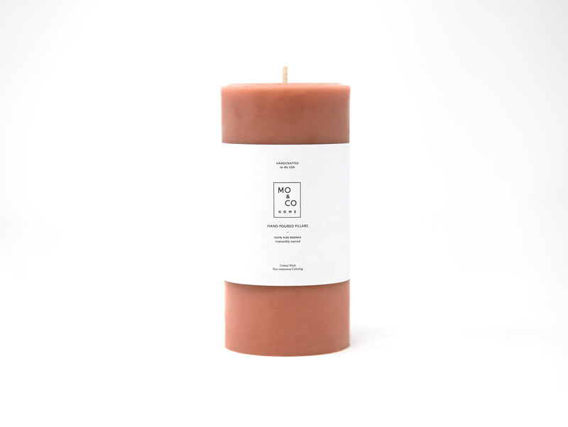 Mo&Co Home - 100% Beeswax Pillar Candle in Terra Cotta, 3x6 Inch, with a clean white label, showcased in a close-up.