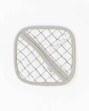 MagicLinen linen pot-holder with pocket shown in close-up, highlighting quilted detailing and loop for hanging, ideal for kitchen use in Athens Cooks' collection.