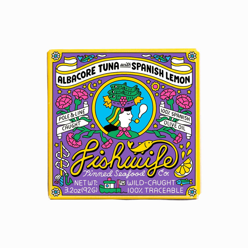 Fishwife - Albacore Tuna with Spanish Lemon packaging featuring a stylized woman, sustainable sourcing banners, and artisanal details, emphasizing Spanish olive oil and lemon flavor.