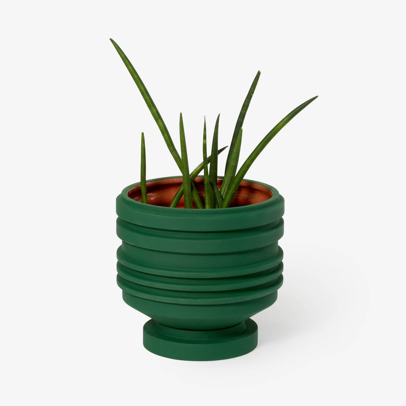 Areaware - Strata Plant Vessel: Blue, a ceramic planter with unique stacked shapes, inspired by sculptural heritage, designed to enhance personal space.