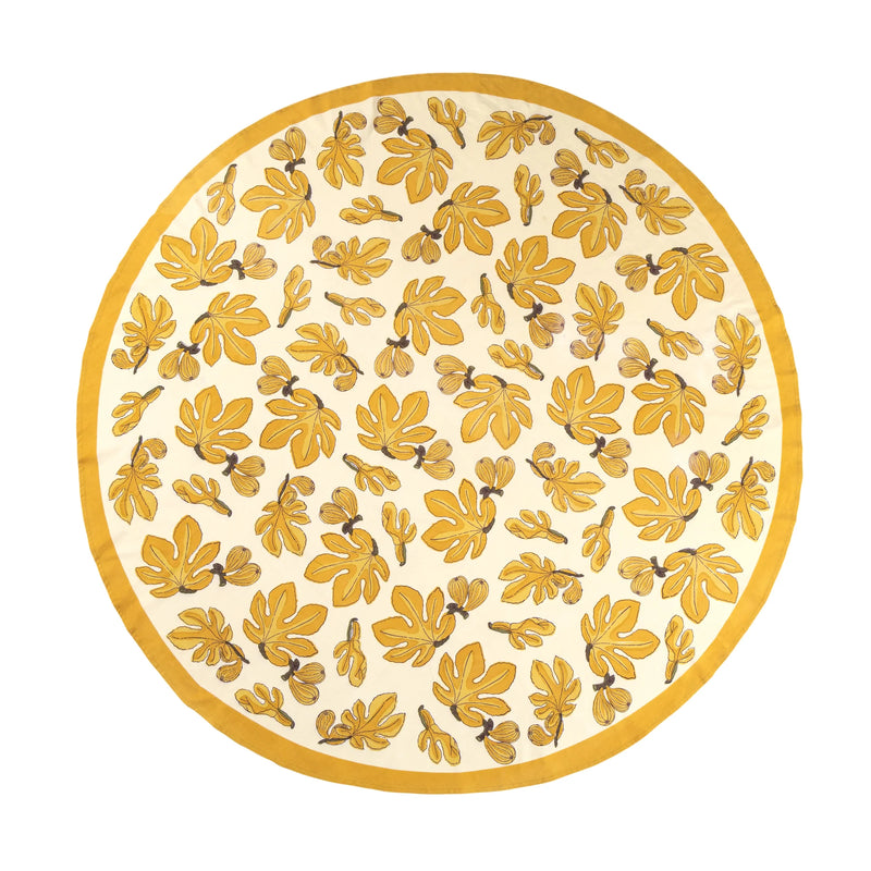 Caravan Home 71 x 106 Fig Citrine Tablecloth, featuring citrine yellow leaves on an ivory backdrop, handprinted for elegant table settings.