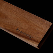 Messermeister Acacia Magnetic Knife Rack: A 17.75 walnut wall-mounted strip with chamfered edges, showcasing laser-etched branding and hidden magnets for stylish knife display.