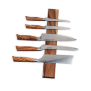 Messermeister | Acacia Magnetic Knife Rack displaying five knives with olive-wood handles, showcasing safe, stylish storage for kitchen tools.