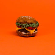 Ware of the Dog - Hand Knit Hamburger Dog Toy: A hand-crocheted lambswool cheeseburger dog toy with squeaker, crafted by Nepalese artisans using natural dyes.
