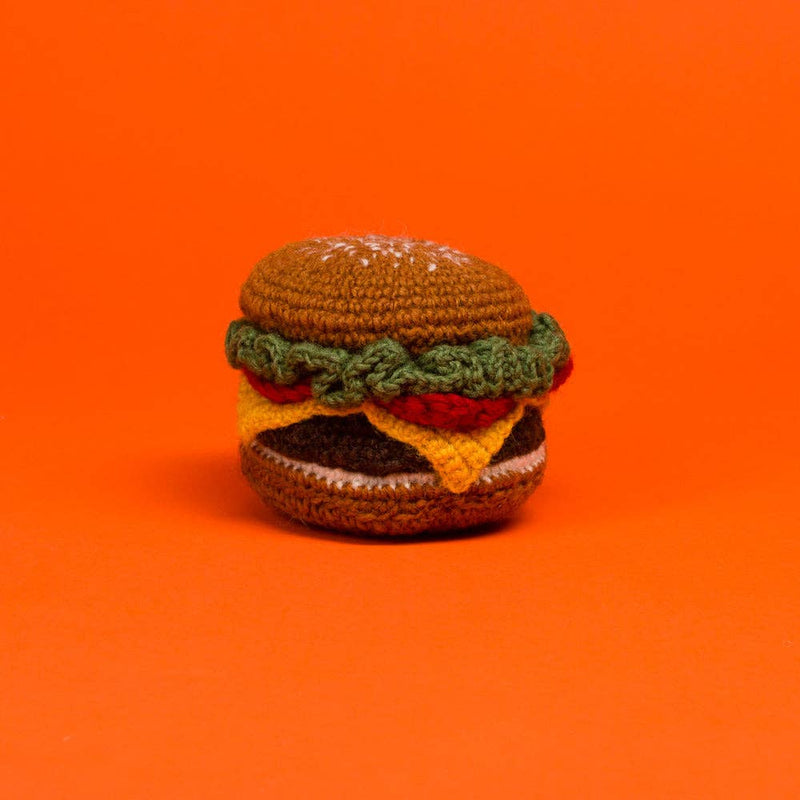 Ware of the Dog - Hand Knit Hamburger Dog Toy: A hand-crocheted lambswool cheeseburger dog toy with squeaker, crafted by Nepalese artisans using natural dyes.