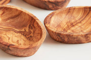 Set of four Verve Culture Italian Olivewood Aperitivo Bowls, showcasing hand-carved, rich wood-grain patterns, perfect for serving appetizers, crafted by artisans in Umbria, Italy.