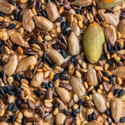 Potters Table - Seeded Olive Oil Flatbreads topped with pumpkin, sunflower, flax, and sesame seeds on a crisp cracker surface, ideal for gourmet gatherings.