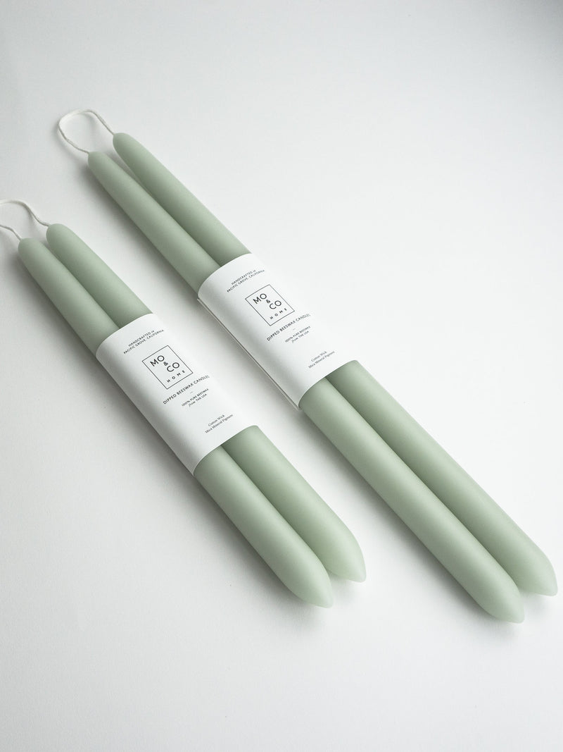 Mo&Co | 100% Beeswax Dipped 14 Tapers, handcrafted in Pacific Grove, California, feature a soft glow, enhancing moments with their natural beeswax purity and elegance.