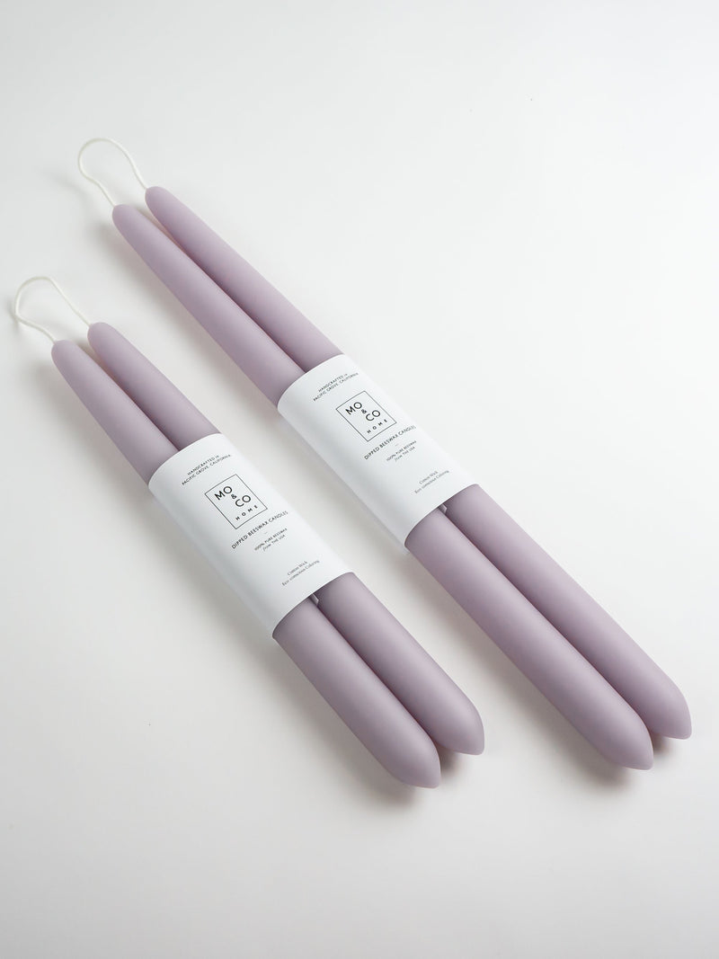 Mo&Co | 100% Beeswax Dipped 14 Tapers - Lavender, elegant hand-dipped candles, ideal for enhancing daily rituals with their warm glow and purifying properties.