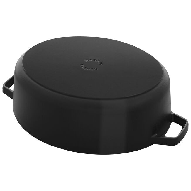 Staub | Wide Oval Dutch Oven - Graphite Grey, enameled cast iron pot with self-basting lid, ideal for braising and baking large meals.