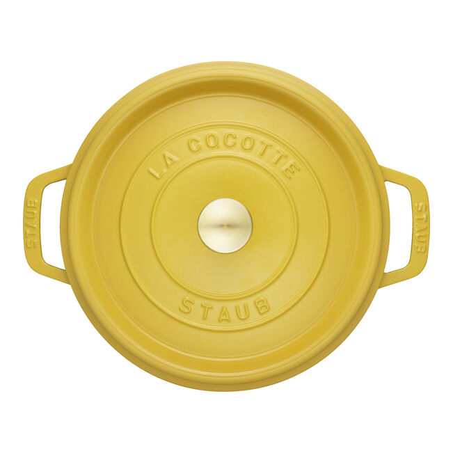 Staub | Round Cocottes - 4 qt Citron: Top-down view of yellow enameled cast-iron Dutch oven with self-basting lid, ideal for slow-cooking and browning.