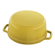 Staub | Round Cocottes - 4 qt Citron, enameled cast-iron casserole pot, shown upside-down, highlighting its sturdy construction and dual handles for versatile cooking.