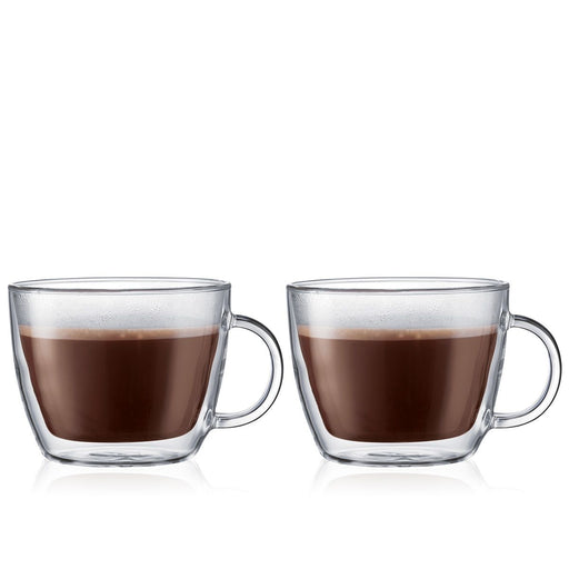 Double-Walled Latte Cups filled with frothy beverages, showcasing their elegant, mouth-blown design that keeps drinks hot or cold without condensation.