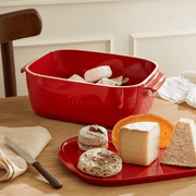 Emile Henry | Cheese Box, Black, showcasing elegant cheese storage and serving, with cheeses on a matching red tray, embodying practical elegance for Athens Cooks' curated kitchen collection.