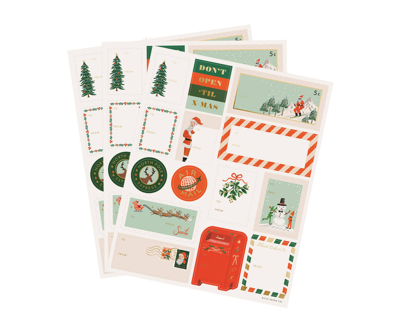 Rifle Paper Co. - Pack of 3 Santa’s Workshop Stickers & Labels with vintage-style Christmas designs, perfect for adding charm to holiday gifts.