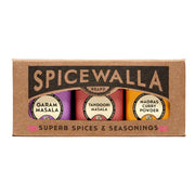 Spicewalla | Masala Collection Gift Set featuring Garam Masala, Tandoori Masala, and Madras Curry Powder tins showcased in a die-cut windowed box.