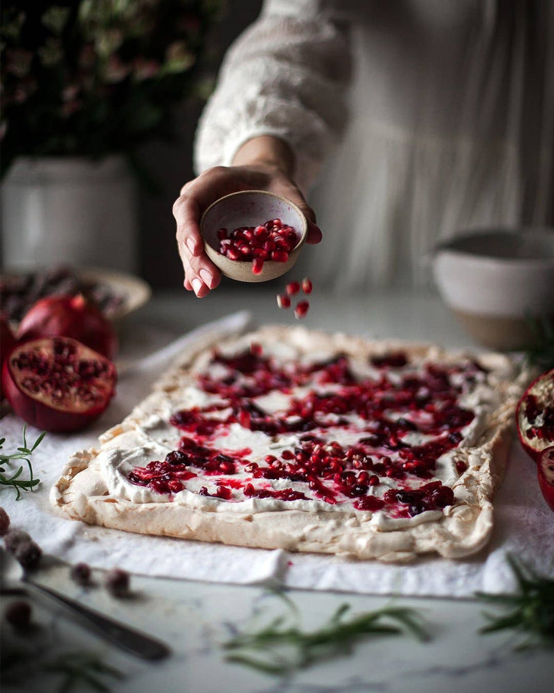 Farmhouse Pottery - Silo Ramekin: Single, displayed as a kitchen accessory, holds pomegranate seeds above a cream-covered dessert, crafted from lead-free stoneware in Vermont.
