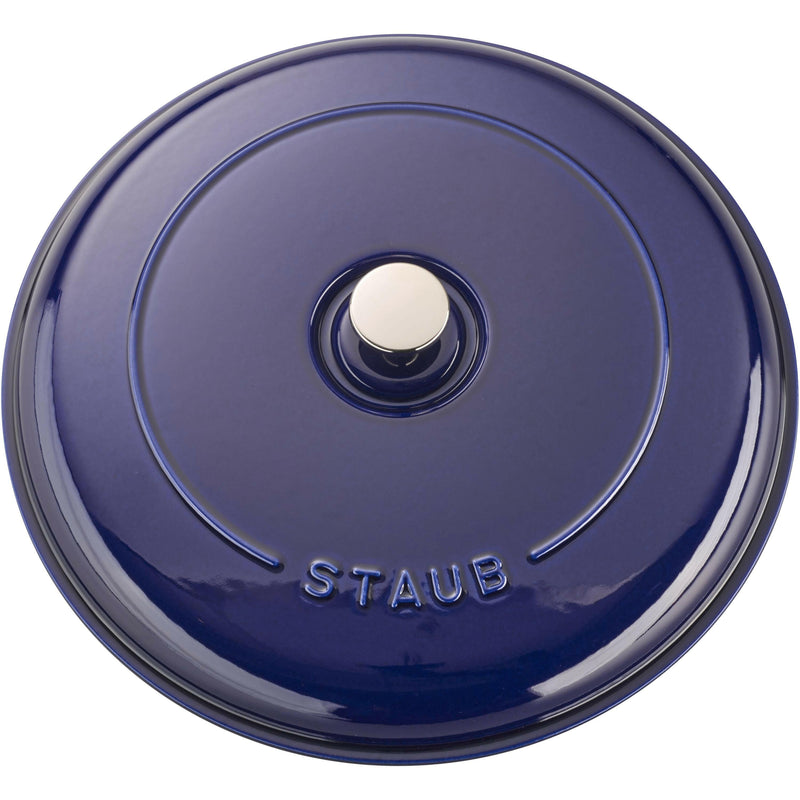 Staub 12 Cast Iron Braiser with Lid, ideal for versatile cooking, features vintage handles and domed lid for moisture retention, perfect for one-dish meals.