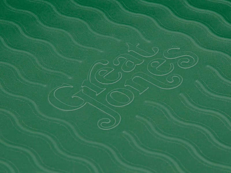 Great Jones | Patty Cake - Broccoli, featuring a wavy, corrugated bottom for easy release and even baking, suitable for kid-friendly cooking.