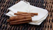 Oliver Pluff & Company - Cider Spices Wassail Kit features cinnamon sticks on muslin bags, perfect for crafting traditional mulled cider, beer, or mead.