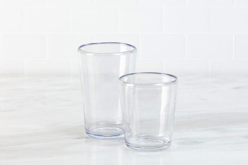 Zwiesel Fortessa Veranda Double Old Fashioned Clear 14oz Tumbler displayed on a countertop, highlighting its rustic, mouth-blown glass appearance in durable polycarbonate.