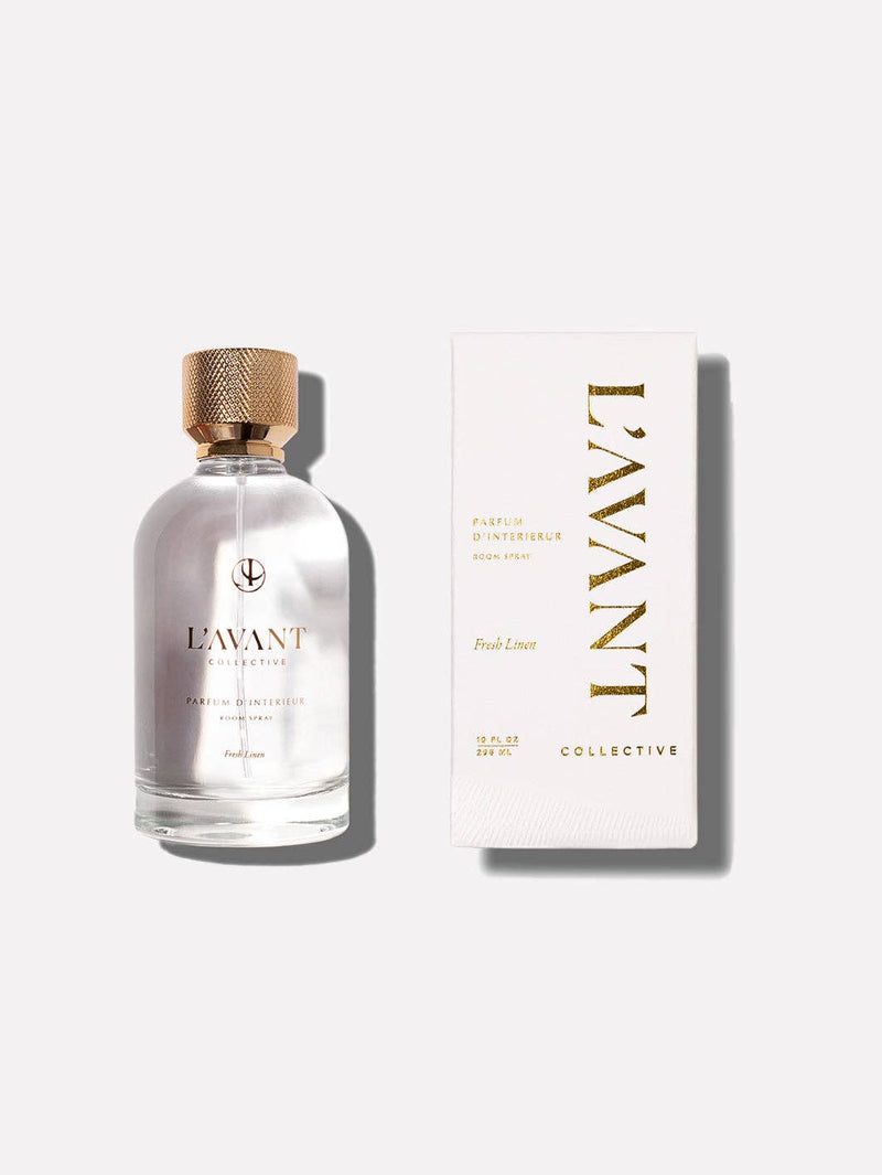 L'AVANT Collective - Fresh Linen Room Spray 100 ml, featuring a glass bottle and elegant box, offers a luxurious scent for your home.