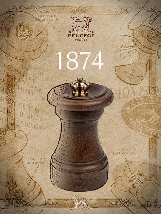 Peugeot | 1874 Manual Wooden Pepper Mill Antique Patina, featuring a classic design with brass knob, inspired by the original Z model from 1874.