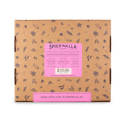 Spicewalla Kitchen Essentials Collection Gift Set, an 18-piece spice tin starter set in a doodled box, perfect for enhancing any kitchen's flavor arsenal.