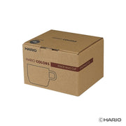 HARIO USA - HARIO Colors Glass Stackable Mug, 300ml packaging with logo, product name, and mug outline. Ideal for saving space and enhancing tabletops.