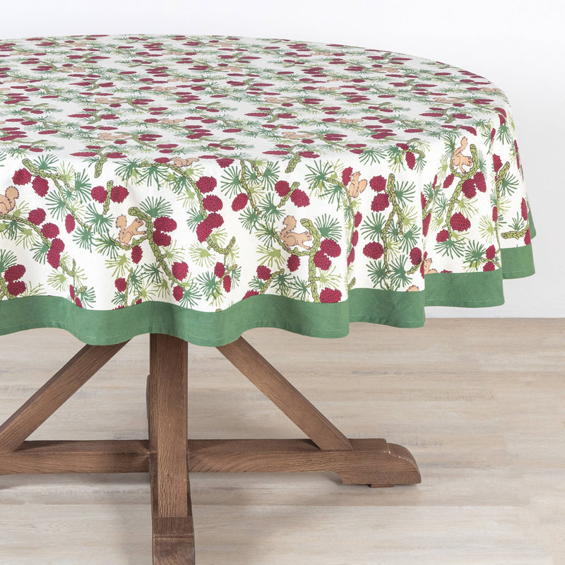 Couleur Nature - Squirrel and Pinecone Red & Brown Tablecloth: 71 x 71 featuring festive pine branches, red pine cones, and squirrels, hand-printed in classic French country style.