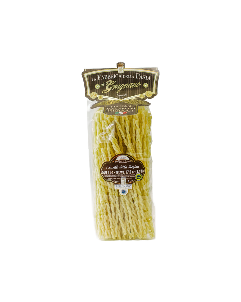 Zia Pia - Fusilli Della Regina by La Fabbrica della Pasta: Clear package of long, twisted fusilli, crafted in Gragnano, Italy, emphasizing artisanal pasta tradition.