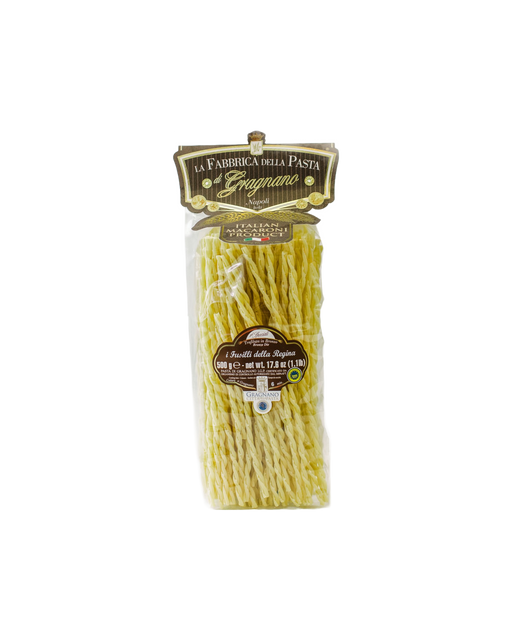 Zia Pia - Fusilli Della Regina by La Fabbrica della Pasta: Clear package of long, twisted fusilli, crafted in Gragnano, Italy, emphasizing artisanal pasta tradition.