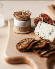 Farmhouse Pottery - Toothpick Holder - Countryman on a grazing board with crackers, blue cheese, and figs, highlighting its elegant design for serving hors d'oeuvres.