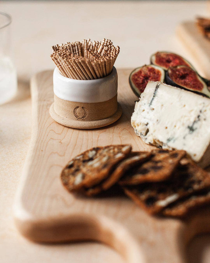 Farmhouse Pottery - Toothpick Holder - Countryman on a grazing board with crackers, blue cheese, and figs, highlighting its elegant design for serving hors d'oeuvres.