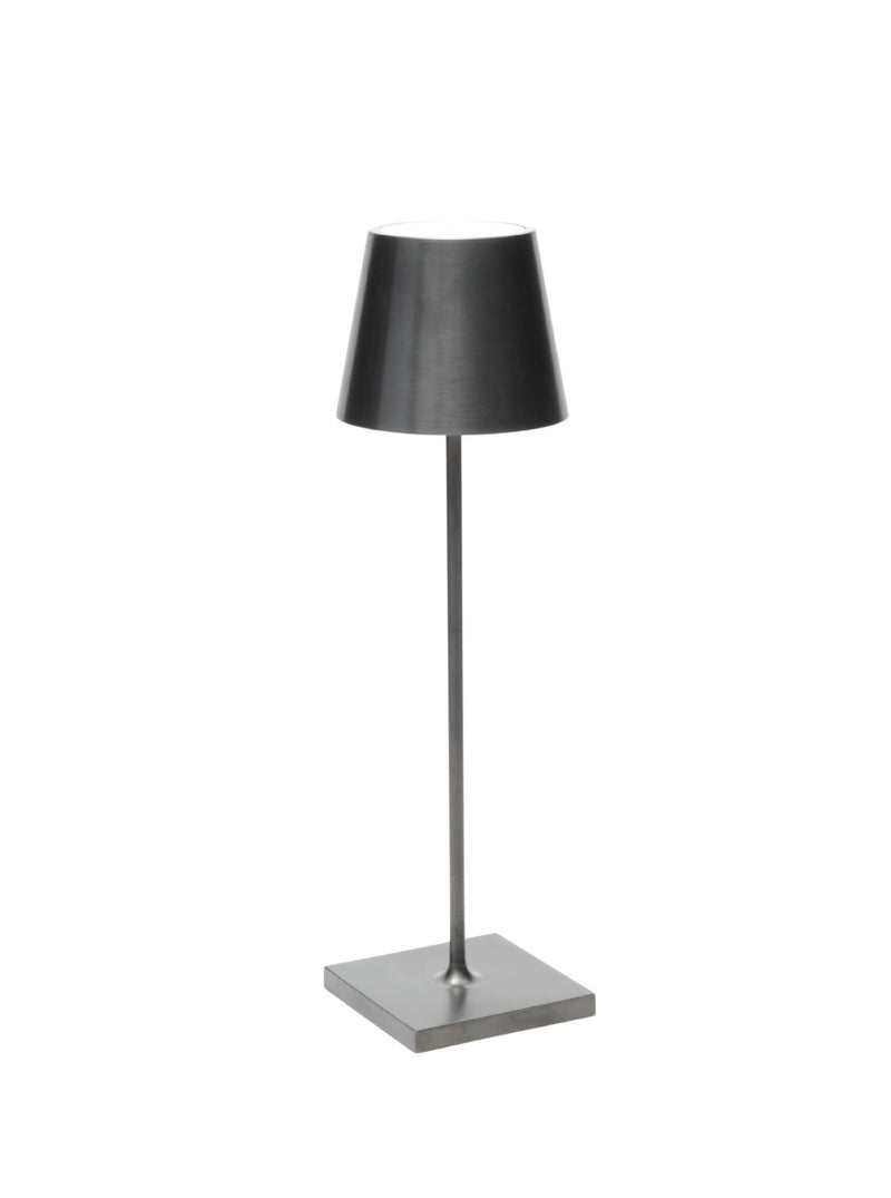 Zafferano America - Poldina Pro Cordless Lamp: Rust, featuring a sleek metal base, tapered shade, and cordless LED design, ideal for modern indoor/outdoor ambiance.