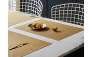 Chilewich | Basketweave Rectangle Placemats - Bon Bon - 14 x 19 displayed on a table, featuring physalis on a plate, highlighting its textured weave and versatile design.